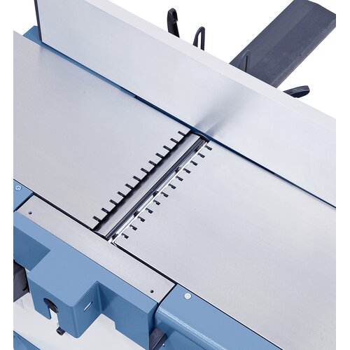 The table is designed with slots on both sides to minimize the noise level.