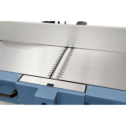 The table is designed with slots on both sides to minimize the noise level.