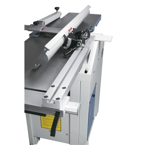 The planer fence is positioned to the side of the machine to keep the required space to a minimum.