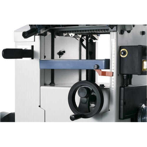 Thicknessing table is guided on four threads. The height can be read on the scale.