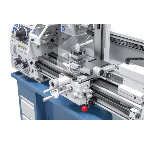 Smoothly-running apron with top support and 4-way tool post holder, handwheels with adjustable metric scale.