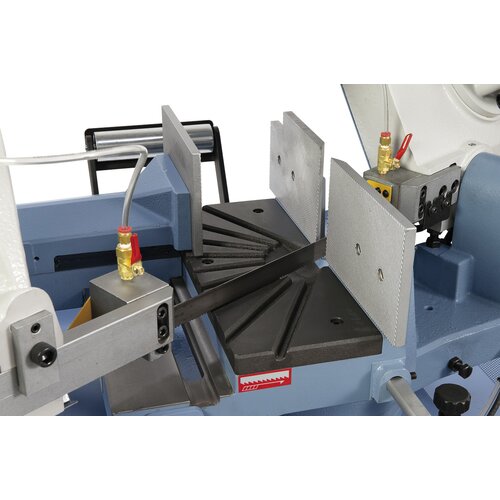 Bandsaw blade guiding with carbide inserts and chip brush to allow for optimal results