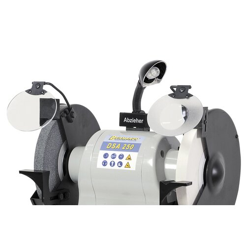 Work lamp, wheel dressing tool and protective glass with magnifier come standard.