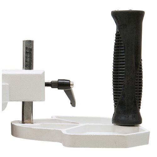Height adjustable guide plate features scale to adjust toeach workpiece