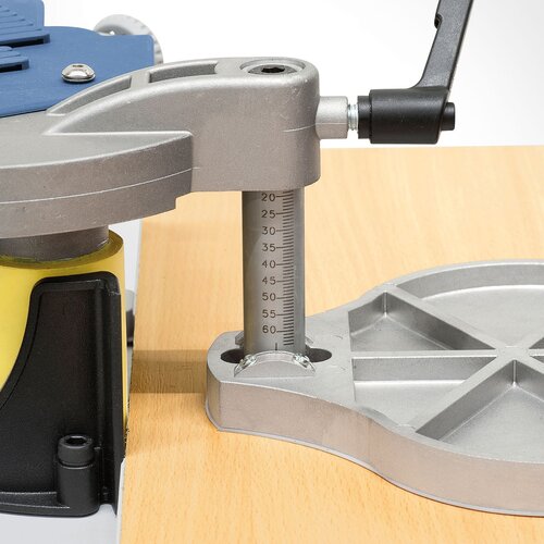Height adjustable guide plate  features scale to adjust to  each workpiece
