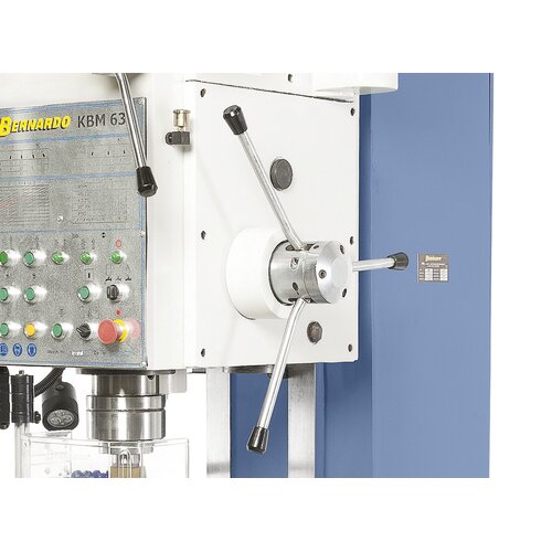 Star handle allows manual spindle feed, clutch lever allows automatic feed