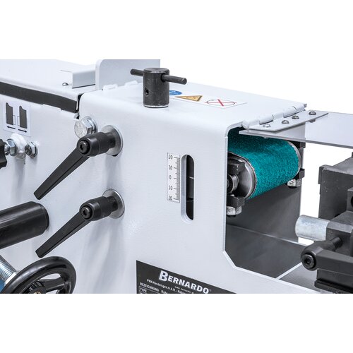 Høydejustering av slipevalsen for sliping utenfor senter