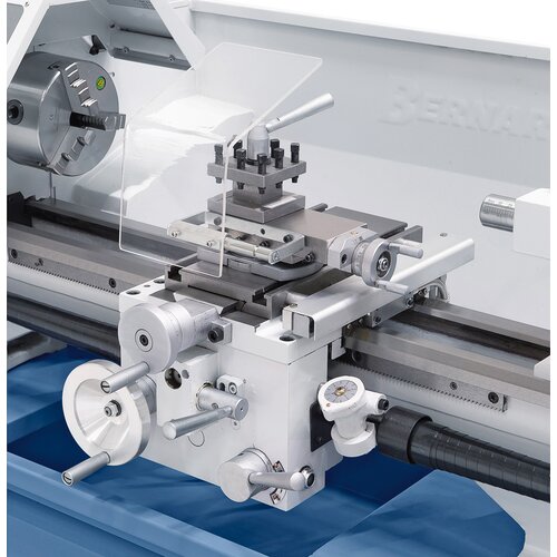 Ergonomically arranged control elements for easy adjustment of longitudinal and cross feed.