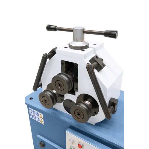 Guiding of the upper roll by precision ground guide rails.