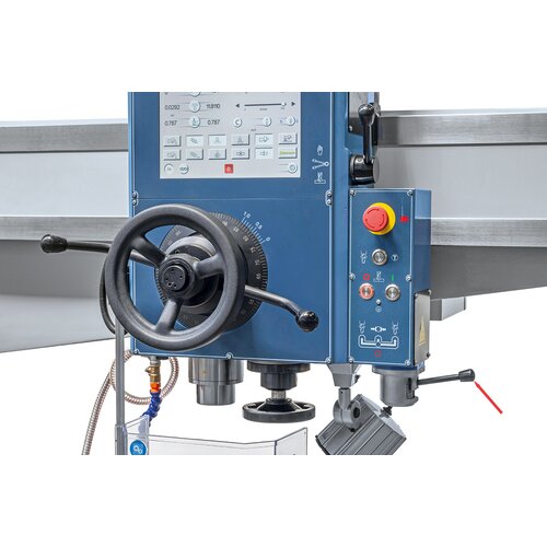 Pilot switch on underside of drill head allows for change of spindle rotation/ spindle engage- or disengagement.