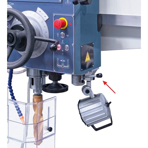 Pilot switch on underside of drill head allows for change of spindle rotation/ spindle engage- or disengagement.