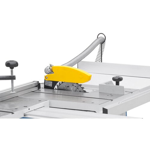Protective sawblade cover with integrated dust port connected on riving knife.