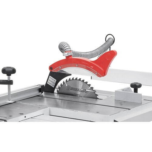 Protective sawblade cover with integrated dust port connected on riving knife.