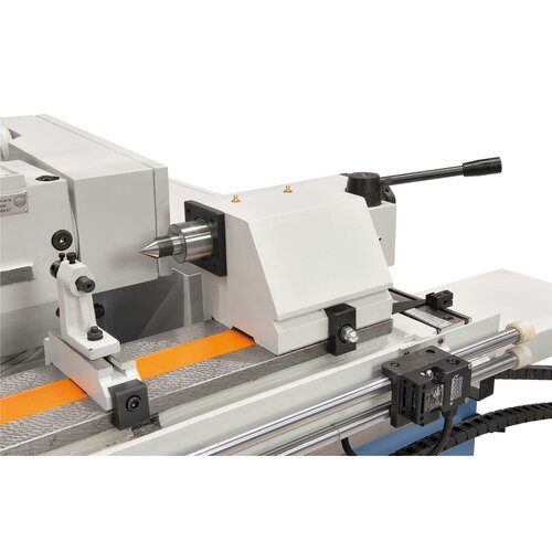 Hydraulic tailstock features top accuracy and rigidity, foot pedal allows for movement.