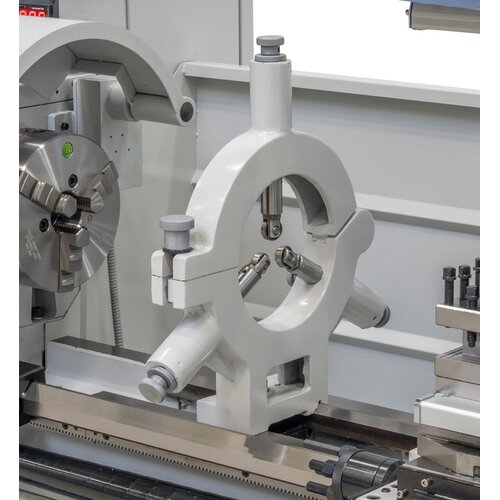 Steady rest supports long and thin workpieces. 