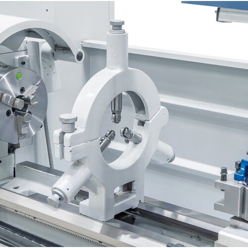Steady rest supports long and thin workpieces. 