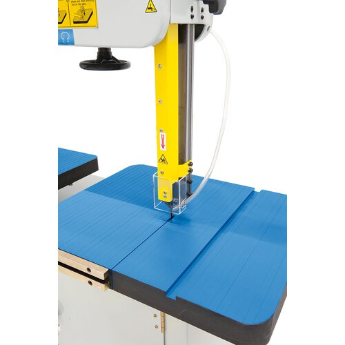 Bandsaw blade guide features ball bearings, adjustable to various workpiece sizes.